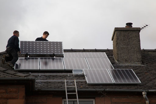 Fixing Topsola PV solar panels on to the roof